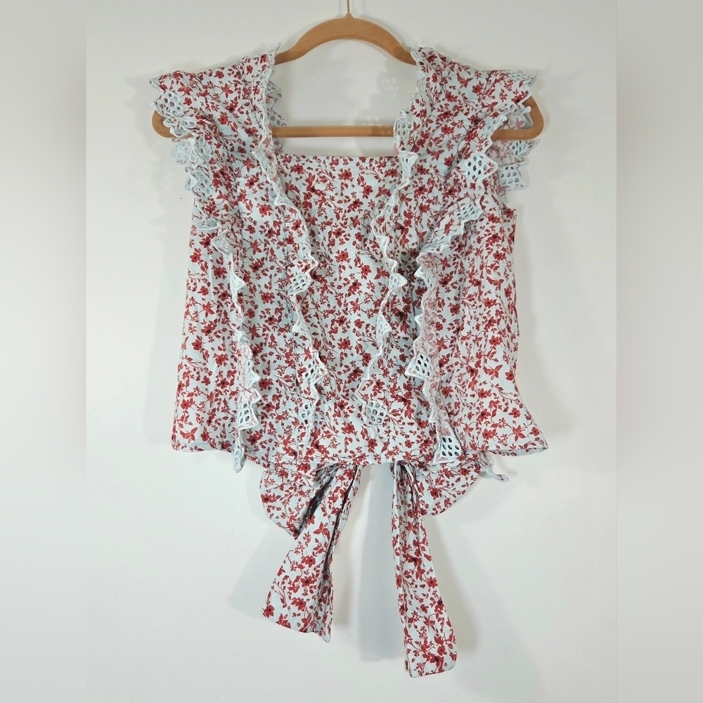 ANTHROPOLOGIE BLUE TASSEL TRINA BACK BOW FLORAL BLOUSE.